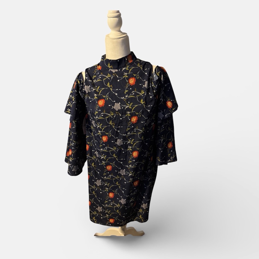 Beautiful dark floral dress with shoulder cutouts.